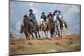 Cowgirl & Cowboy at Full Gallop-Terry Eggers-Mounted Photographic Print