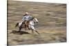 Cowgirl Riding at Full Speed in Motion-Terry Eggers-Stretched Canvas