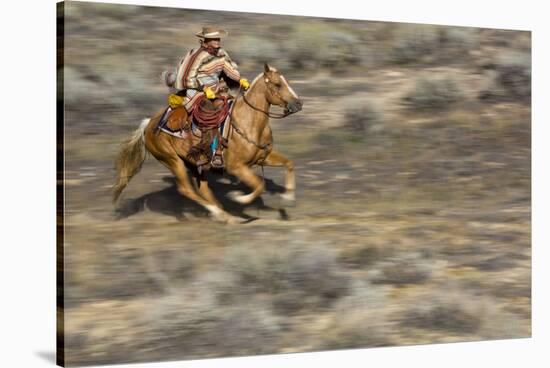 Cowgirl Riding at Full Speed in Motion-Terry Eggers-Stretched Canvas