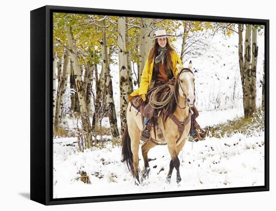 Cowgirl Riding in Autumn Aspens with a Fresh Snowfall-Terry Eggers-Framed Stretched Canvas