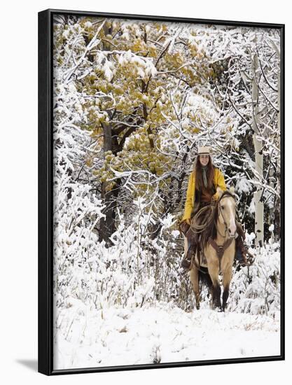 Cowgirl Riding in Autumn Aspens with a Fresh Snowfall-Terry Eggers-Framed Photographic Print