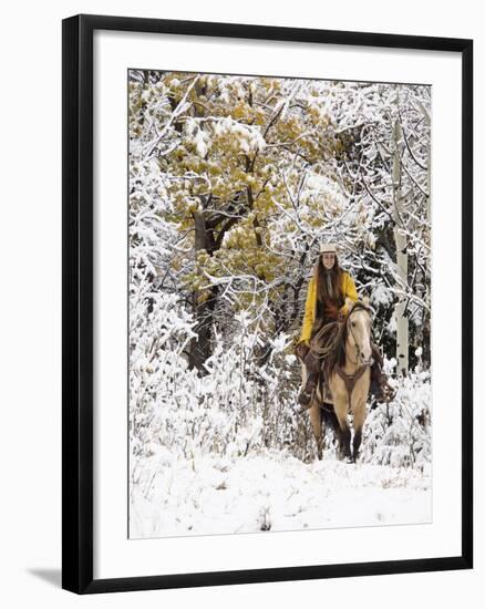 Cowgirl Riding in Autumn Aspens with a Fresh Snowfall-Terry Eggers-Framed Photographic Print