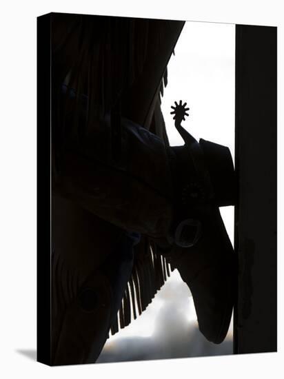 Cowgirl's Boot Silhouette, Flitner Ranch, Shell, Wyoming, USA-Carol Walker-Stretched Canvas