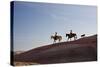 Cowgirls and Dogs along the Ridge of the Painted Hills-Terry Eggers-Stretched Canvas