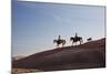 Cowgirls and Dogs along the Ridge of the Painted Hills-Terry Eggers-Mounted Photographic Print