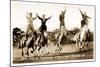 Cowgirls Standing on Horses-null-Mounted Art Print