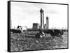 Cows Grazing Near Nuclear Power Plant-null-Framed Stretched Canvas