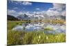 Cows grazing on green pastures surrounding the alpine lake, Val Bugliet, Canton of Graubunden, Enga-Roberto Moiola-Mounted Photographic Print