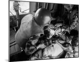 Cpl. James Farley and Pfc. Wayne Hoilien Bandaging Sgt. Billie Owens' Shoulder, Yankee Papa 13-Larry Burrows-Mounted Photographic Print