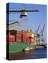 Crane Lifting Containers to and from Cargo Ship-Hans Peter Merten-Stretched Canvas