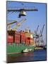 Crane Lifting Containers to and from Cargo Ship-Hans Peter Merten-Mounted Photographic Print