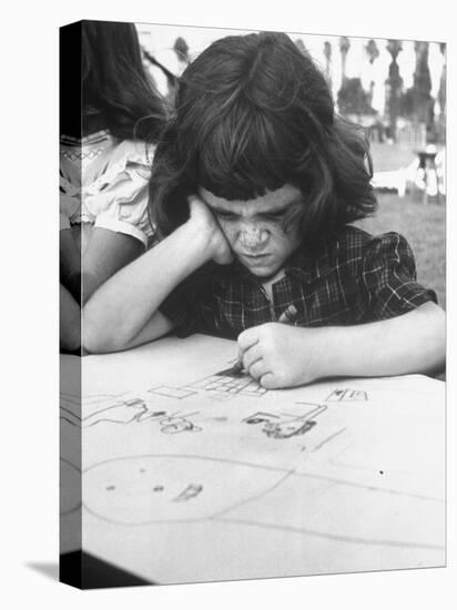 Crayon Artist Working at Her Drawing-Ed Clark-Stretched Canvas