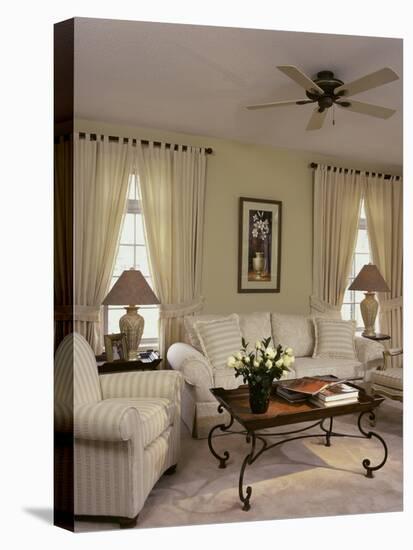 Cream Colored Living Room with Ornate Coffee Table-null-Stretched Canvas