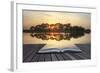 Creative Concept Image of Refelcted Lake Sunset Coming out of Pages in Magical Book-Veneratio-Framed Photographic Print