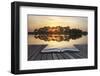 Creative Concept Image of Refelcted Lake Sunset Coming out of Pages in Magical Book-Veneratio-Framed Photographic Print