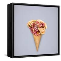 Creative Still Life of an Ice Cream Waffle Cone with Flowers on Grey Background-Fisher Photostudio-Framed Stretched Canvas