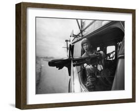 Crew Chief Lance Cpl. James C. Farley Manning Helicopter Machine Gun of Yankee Papa 13-Larry Burrows-Framed Premium Photographic Print