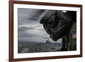 Crew Chief Scans the Area from a Uh-1N Huey Helicopter-null-Framed Photographic Print