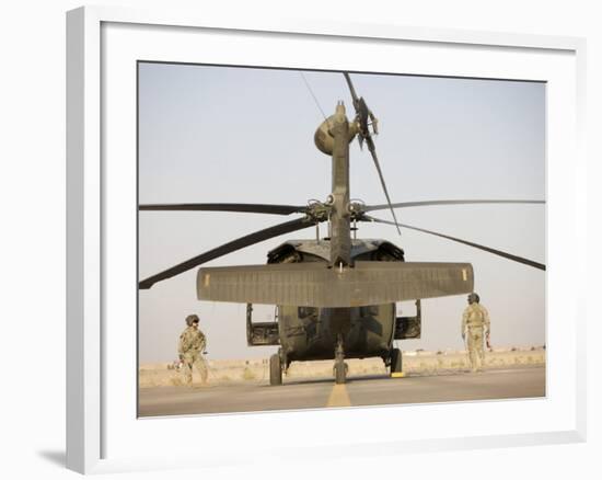 Crew Chiefs Stand Beside their UH-60L Black Hawk Helicopter-null-Framed Photographic Print