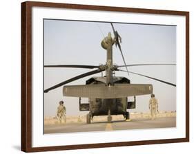 Crew Chiefs Stand Beside their UH-60L Black Hawk Helicopter-null-Framed Photographic Print