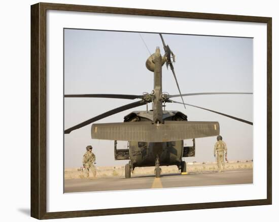 Crew Chiefs Stand Beside their UH-60L Black Hawk Helicopter-null-Framed Photographic Print