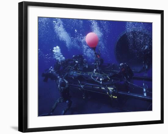 Crewmen Disconnect the Cargo Straps from the Combat Rubber Raiding Craft On the Dry Deck Shelter-Stocktrek Images-Framed Photographic Print