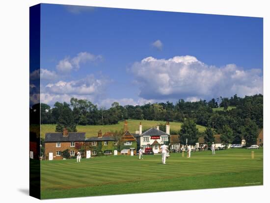 Cricket on Village Green, Surrey, England-Jon Arnold-Stretched Canvas