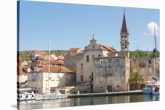 Croatia, Brac, Milna. Church of our Lady of the Annunciation 18th century dominates waterfront.-Trish Drury-Stretched Canvas