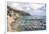 Croatia, Dubrovnik. View of marina and coastline from old city wall. Fisherman stands on shore.-Trish Drury-Framed Photographic Print