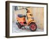 Croatia, Hvar. Bright orange vespa bike in the town of Hvar. (Editorial Use Only)-Julie Eggers-Framed Photographic Print