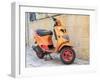 Croatia, Hvar. Bright orange vespa bike in the town of Hvar. (Editorial Use Only)-Julie Eggers-Framed Photographic Print