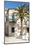 Croatia, Hvar Island, Stari Grad. Uncrowded. Bicycle parked at cafe.-Trish Drury-Mounted Photographic Print