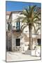 Croatia, Hvar Island, Stari Grad. Uncrowded. Bicycle parked at cafe.-Trish Drury-Mounted Photographic Print