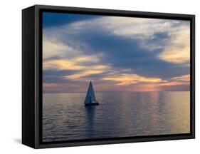 Croatia, Rovinj, Istria. Sailing boat on the Adriatic Sea outside the harbor of Rovinj at sunset.-Julie Eggers-Framed Stretched Canvas