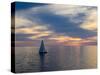 Croatia, Rovinj, Istria. Sailing boat on the Adriatic Sea outside the harbor of Rovinj at sunset.-Julie Eggers-Stretched Canvas