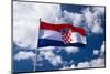 Croatian flag against blue sky and clouds, Ston, Croatia-Russ Bishop-Mounted Photographic Print