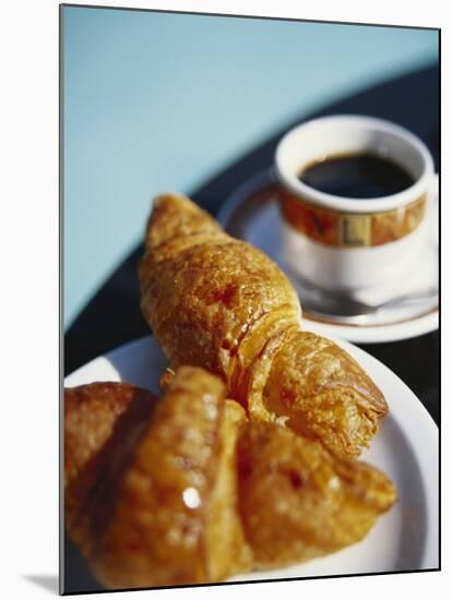 Croissant and Black Coffee on Table, St. Martin, Caribbean-Greg Johnston-Mounted Photographic Print