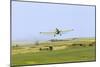 Crop Duster Airplane Spraying Farm Field Near Mott, North Dakota, USA-Chuck Haney-Mounted Photographic Print