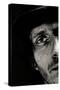 Cropped Portrait of a Man with Hat Starring into the Camera-Torsten Richter-Stretched Canvas
