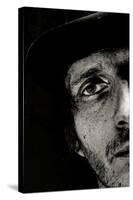 Cropped Portrait of a Man with Hat Starring into the Camera-Torsten Richter-Stretched Canvas