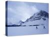 Cross Country Skiers by a Mountain-null-Stretched Canvas