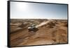 cross country vehicle between the opal mines in Coober Pedy, outback Australia-Rasmus Kaessmann-Framed Stretched Canvas