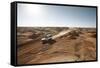 cross country vehicle between the opal mines in Coober Pedy, outback Australia-Rasmus Kaessmann-Framed Stretched Canvas