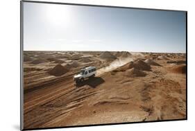 cross country vehicle between the opal mines in Coober Pedy, outback Australia-Rasmus Kaessmann-Mounted Photographic Print