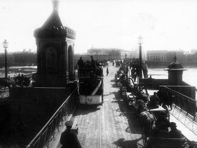https://imgc.allpostersimages.com/img/posters/crossing-the-nicholas-bridge-from-vasilievsky-island-st-petersburg-1903_u-L-PPYXY60.jpg?artPerspective=n
