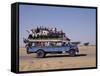 Crowded Bedford Bus Travels Along Main Road from Khartoum to Shendi, Old Market Town on Nile River-Nigel Pavitt-Framed Stretched Canvas