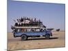 Crowded Bedford Bus Travels Along Main Road from Khartoum to Shendi, Old Market Town on Nile River-Nigel Pavitt-Mounted Photographic Print