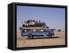Crowded Bedford Bus Travels Along Main Road from Khartoum to Shendi, Old Market Town on Nile River-Nigel Pavitt-Framed Stretched Canvas