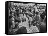 Crowded Outdoor Cafe in Rapallo, People Seated around Small Tables, Waiter Passing Through-null-Framed Stretched Canvas