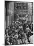 Crowds of People Waiting to See Radio City Music Hall's Easter Show-Yale Joel-Mounted Photographic Print